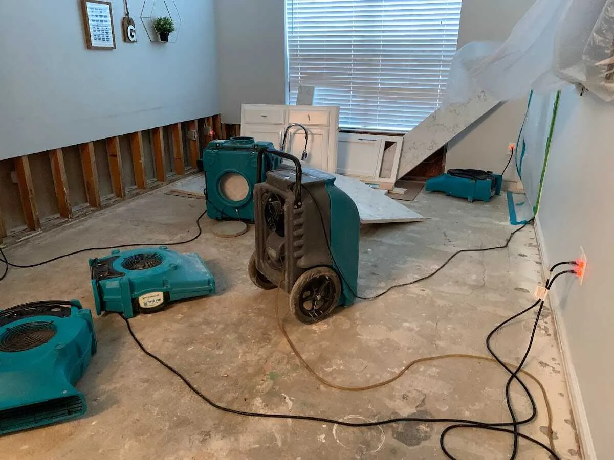 Dehumidifier in flood-cut room for Water Damage Restoration in Athens